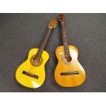 An acoustic Falcon guitar model No. FG103 bearing internal paper label and an Encore model No.