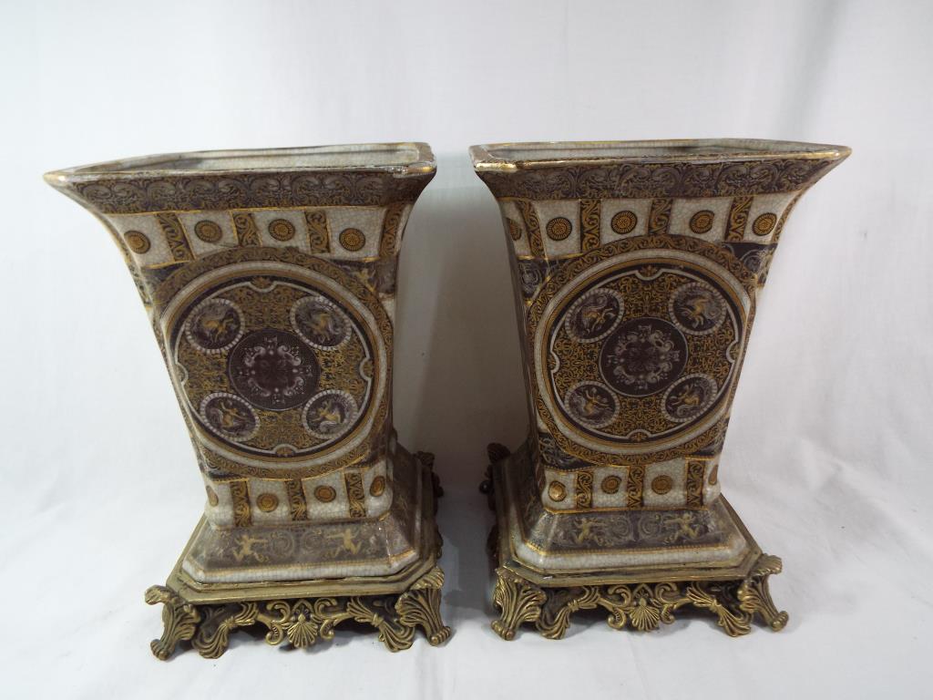 A pair of good quality brass and ceramic