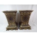 A pair of good quality brass and ceramic