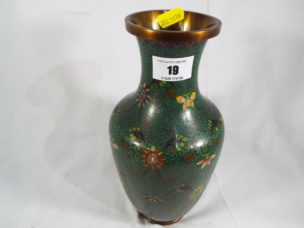 A good quality cloisonne vase, green wit