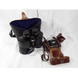 An Ascot cased pair of binoculars and a