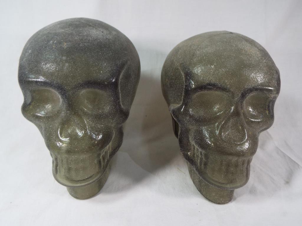 A pair of unusual Gothic glass skulls Es