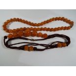 Amber - two amber necklaces, approximate