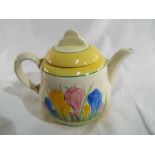 Clarice Cliff - a small lidded teapot de