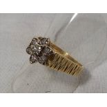 A lady's hallmarked 18ct gold diamond cl