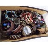 A large quantity of modern costume jewellery to include bangles, bracelets,