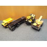 A range of Tonka vehicles to include a crane, a car transporter,