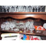 A collection of good quality glassware to include a hand cut Webb continental lead crystal bell,