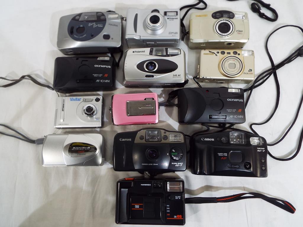 A good lot to include approximately ten cameras predominantly in cases,