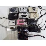 A good lot to include approximately ten cameras predominantly in cases,