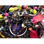 A large quantity of unsorted costume jewellery