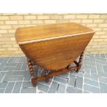 A good quality oak drop leaf barley twist gate leg table 73 cm (h) x 132 cm x 89 cm