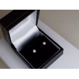 A lady's pair of 9 carat gold 33pt diamond solitaire stud earrings (unused surplus retail stock) -