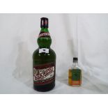 A bottle of "Black Bottle" Scotch Whisky by Gordon Graham & Co Aberdeen 75 cl and a miniature