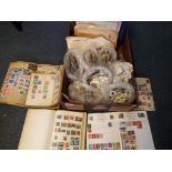 A good lot to include 7 stamp albums containing UK and worldwide stamps and a large quantity of