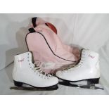 A good quality pair of ice skates by ISK8 in a Nike Bauer carry case.