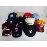 A collection of eleven baseball and American Football caps to include Miami Dolphins,