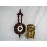 A brass Smiths mantle clock inscribed Smiths Industries Ltd Clock and Watch Division and a wall