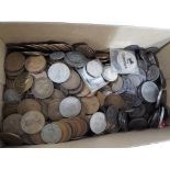 A large quantity of coins to include a small quantity of silver coins, pennies,