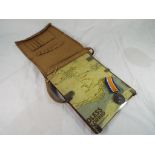 World War One (WWI) - a canvas map case marked Machine Gun Corps 1941 and a World War One British