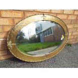 A large bevel edged framed mirror 75 cm x 59 cm