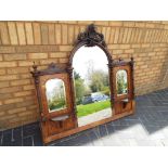 A good quality Victorian mahogany inlaid over mantle mirror,