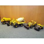 A range of Tonka vehicles to include two tipper trucks,