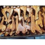 Unused retail stock - a collection of approximately 38 carved wooden puzzles in the form of