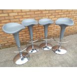 Four adjustable bar stools