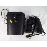 A good quality pair of Miranda 16 x 50 coated optics binoculars with lens caps and with protective