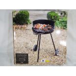 Unused retail stock - an outdoor round charcoal adjustable grill designed with pull-along handle