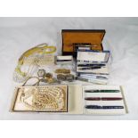 A good mixed lot to include pearl necklaces, a collection of watches to include Rotary 17 jewel,