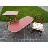 A wicker occasional table with inlaid pattern,