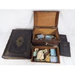 A good lot to include a large 19th century leather bound Holy Bible printed by William Collins,