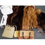 A good lot to include five furs comprising two fur stoles and a fur hat, two fur jackets,