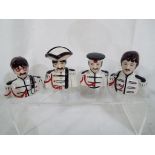 Lorna Bailey - a set of four novelty Beatle ceramic busts.