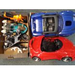 A good lot of Action Man toys to include two large cars, a motorbike,