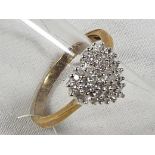 A lady's 9 carat gold 25 pt 1/4 carat diamond cluster ring, (unused surplus retail stock) size P,