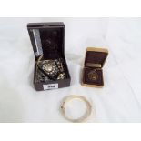 A box of costume jewellery to include two ladies wristwatches,