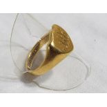 A gentleman's hallmarked 18 carat gold signet ring, approximate weight 8.74 grams.