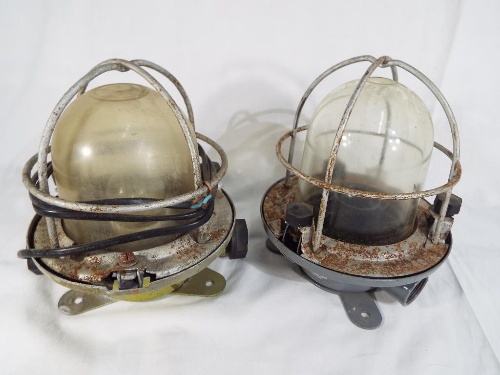 Two vintage metal bulkhead ship's lights,