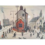 After L S Lowry - A print depicting a street in Clitheroe, mounted and framed under glass.
