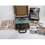 An Olivetti portable typewriter in carry case,