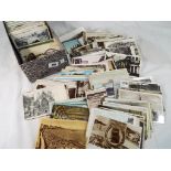 A lot containing in excess of 600 early - mid period UK topographical postcards to include real