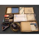 A mixed lot to include vintage table linens, a selection of vintage tins, brass tableware,