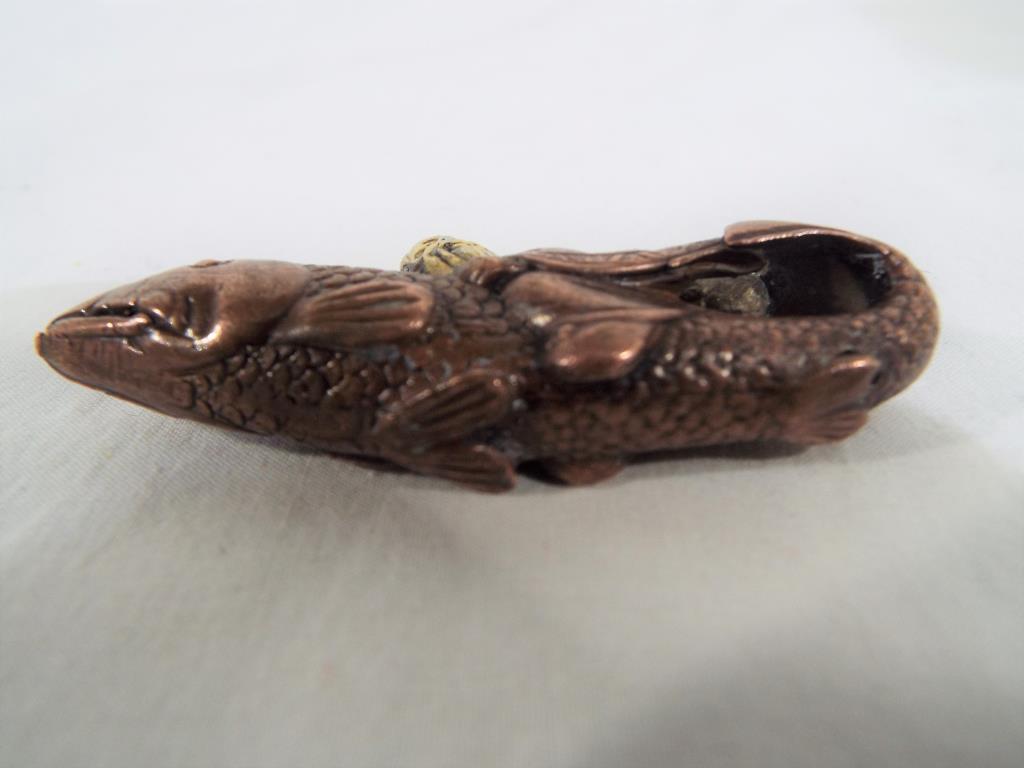 An Oriental bronze figure depicting a fish God 3 cm x 7.5 cm. - Image 3 of 3