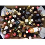 A quantity of 50 miniature bottles to include whisky, gin,