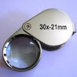 A Jeweller's Loupe 30 x magnification 21 mm,