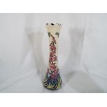 Moorcroft - a Moorcroft limited edition vase made for Liberty, signed to the base 27 of 50.