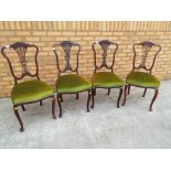 A set of 4 Victorian mahogany dining chairs